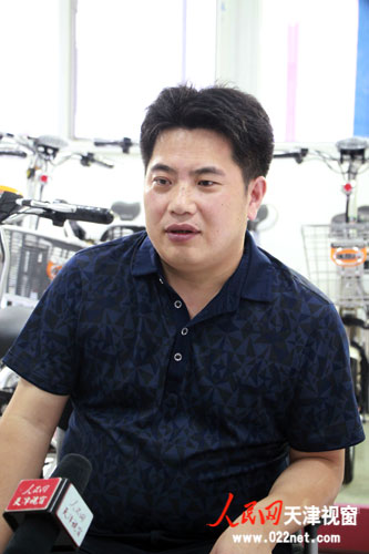 采访天津市美丽行锂电车科技有限公司总经理张亚军。