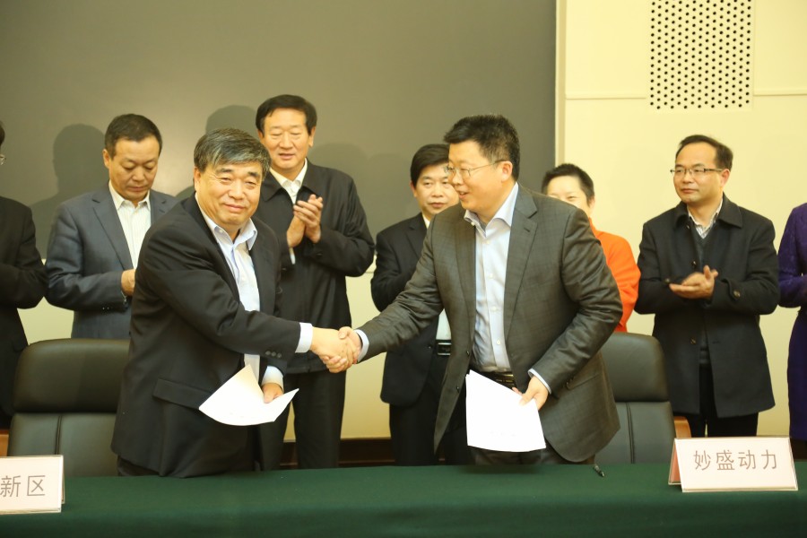 沈北新区区长金志生与邱则有签约