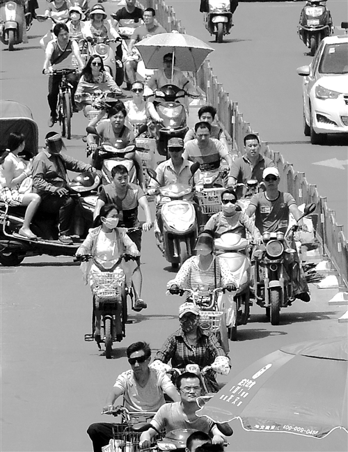 电动自行车路权之争是关键 “限电”潮会否出现待观察