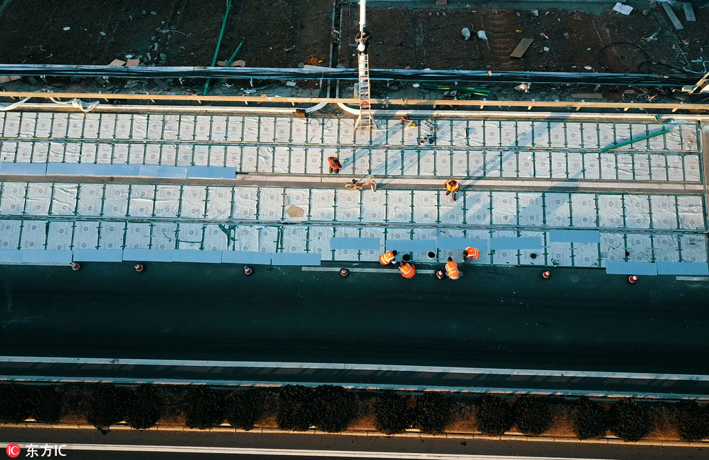 济南正建设全球首条光伏高速公路 年底竣工通车发电