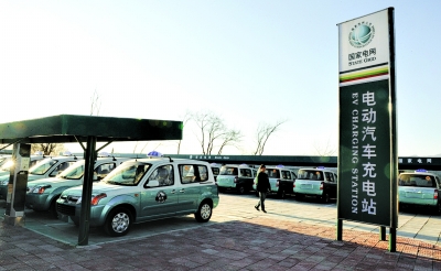 “新能源车”缺席政府工作报告 市场化急待破题 